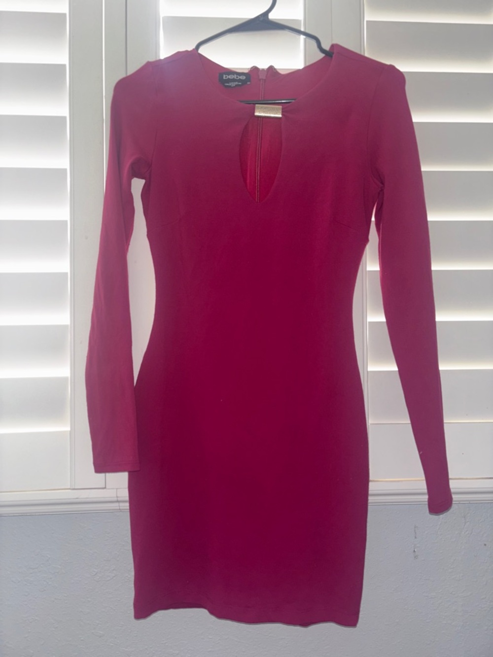 bebe Long-Sleeve Keyhole Bodycon Dress in Wine